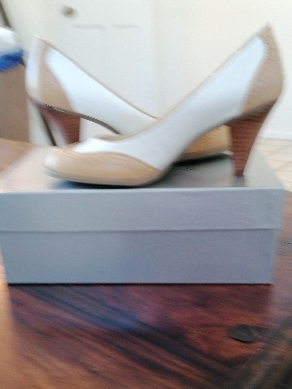 Classic Two-Tone Women's Leather Pumps - Cream and Tan. Refined stitching.